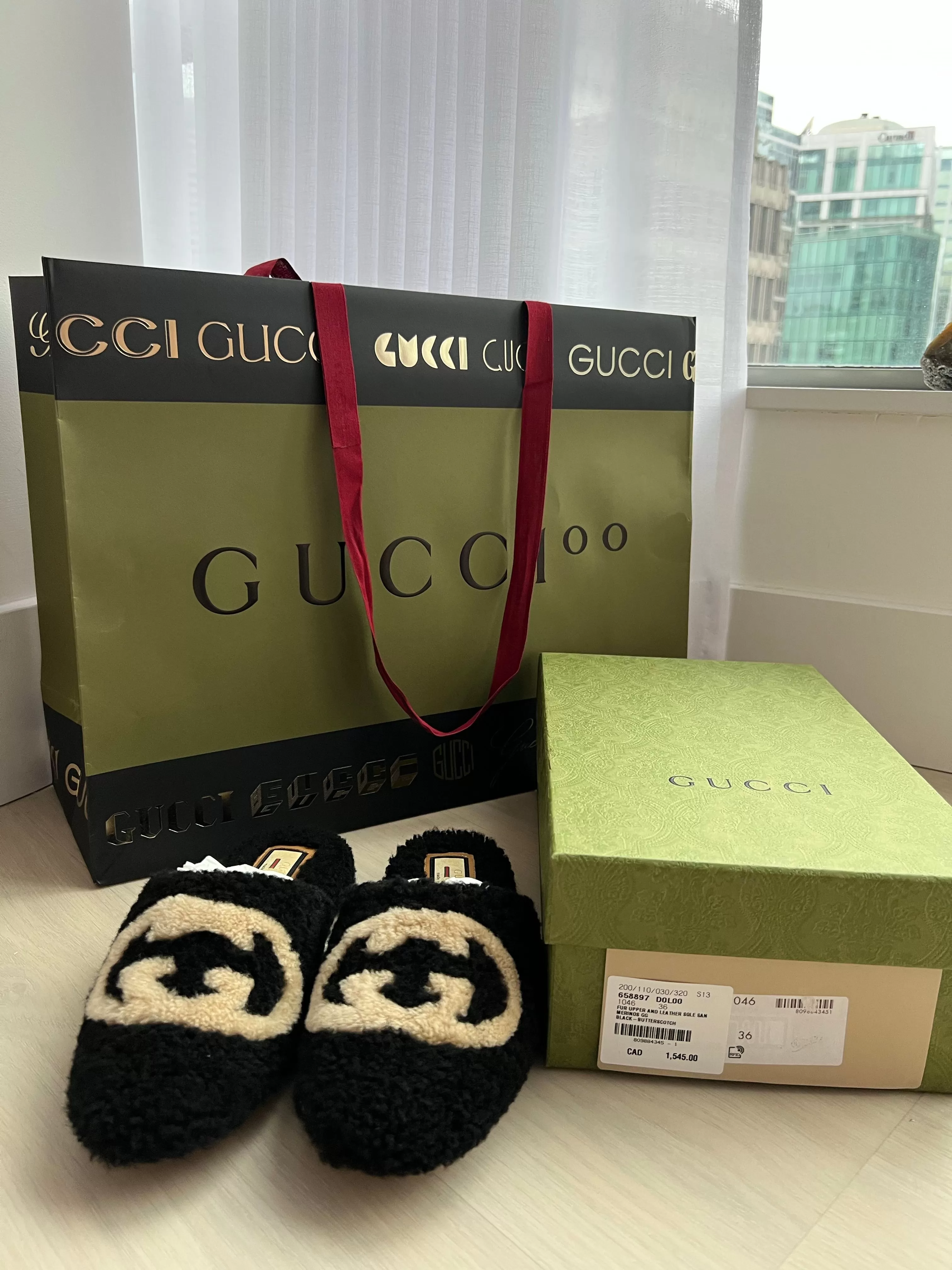 Gucci GG Shearling Mules