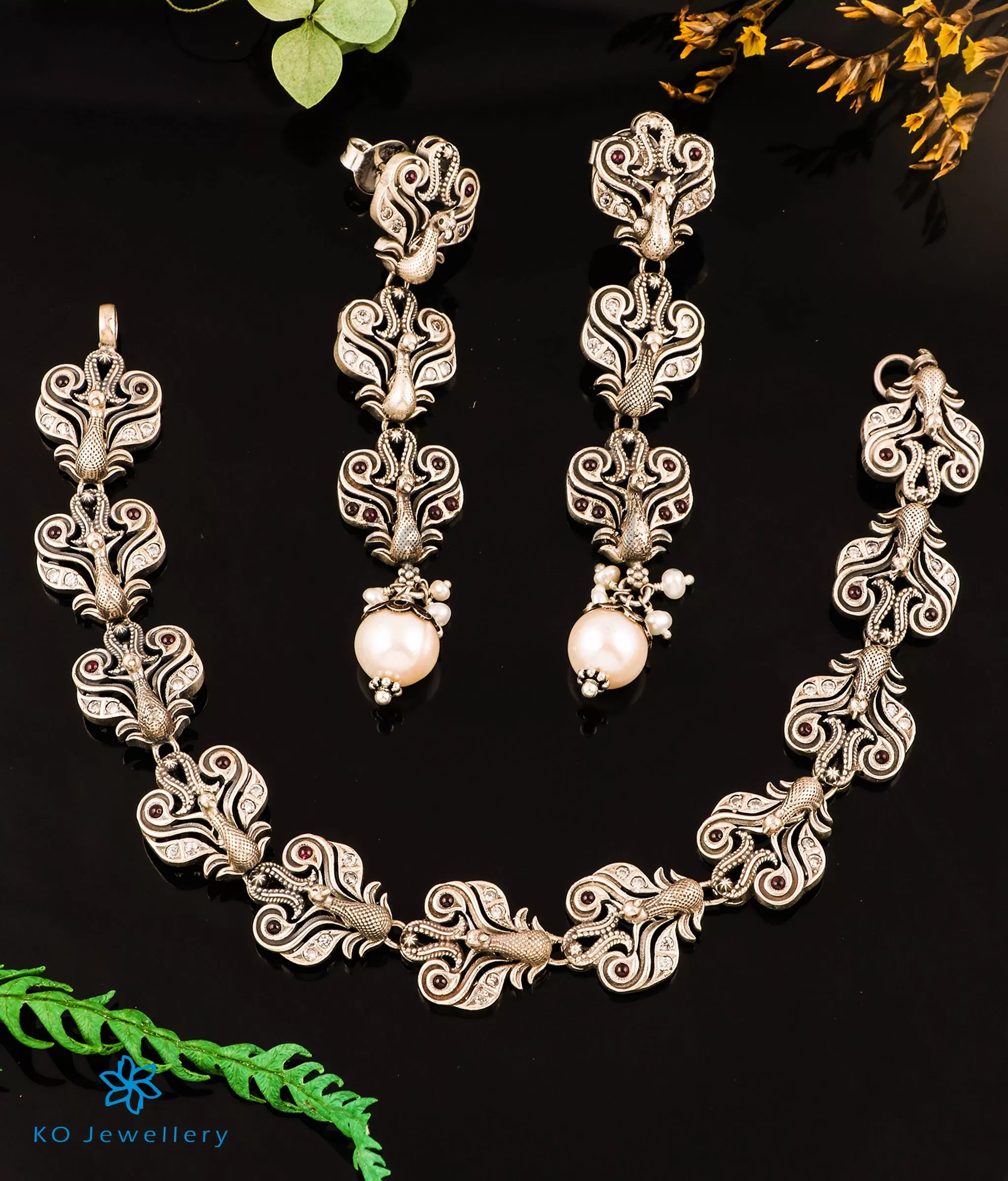 The Sahil Silver Peacock Choker Necklace & Earrings